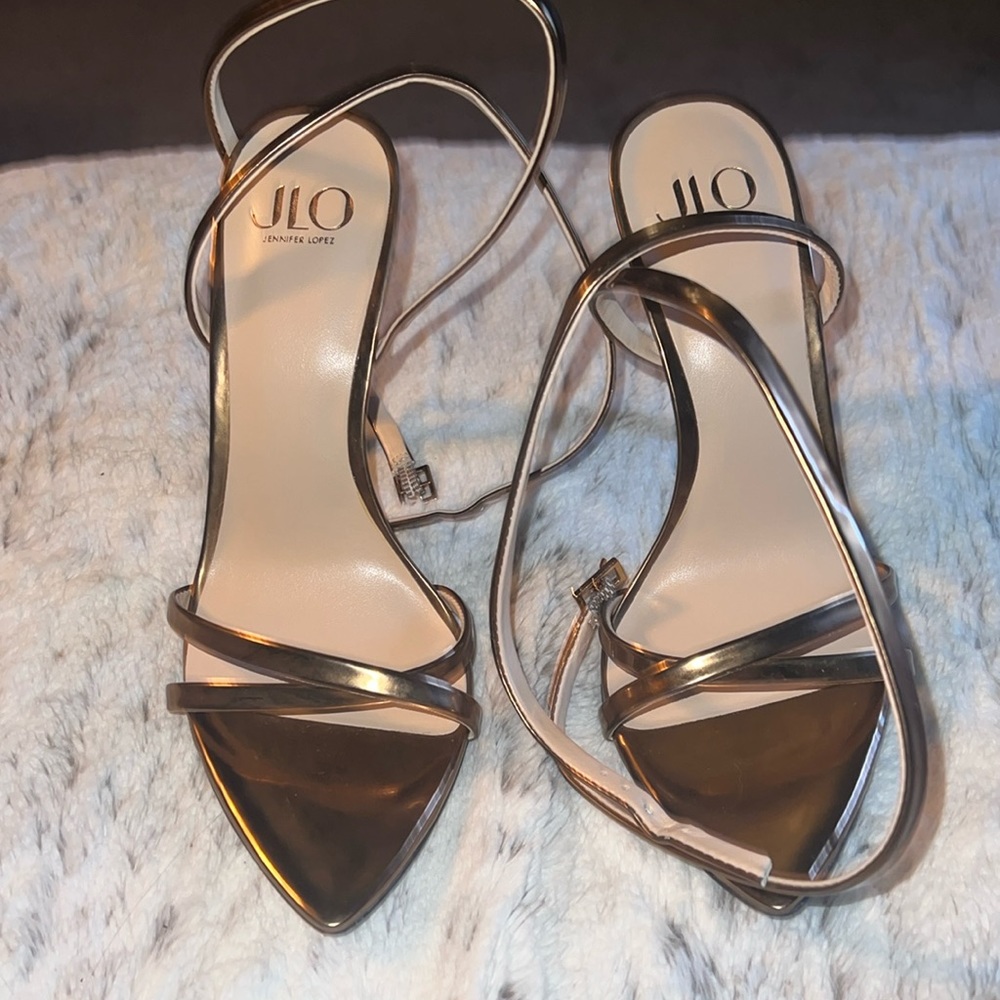 Bronze gold, J Lo heels, size 8 that wrap up leg